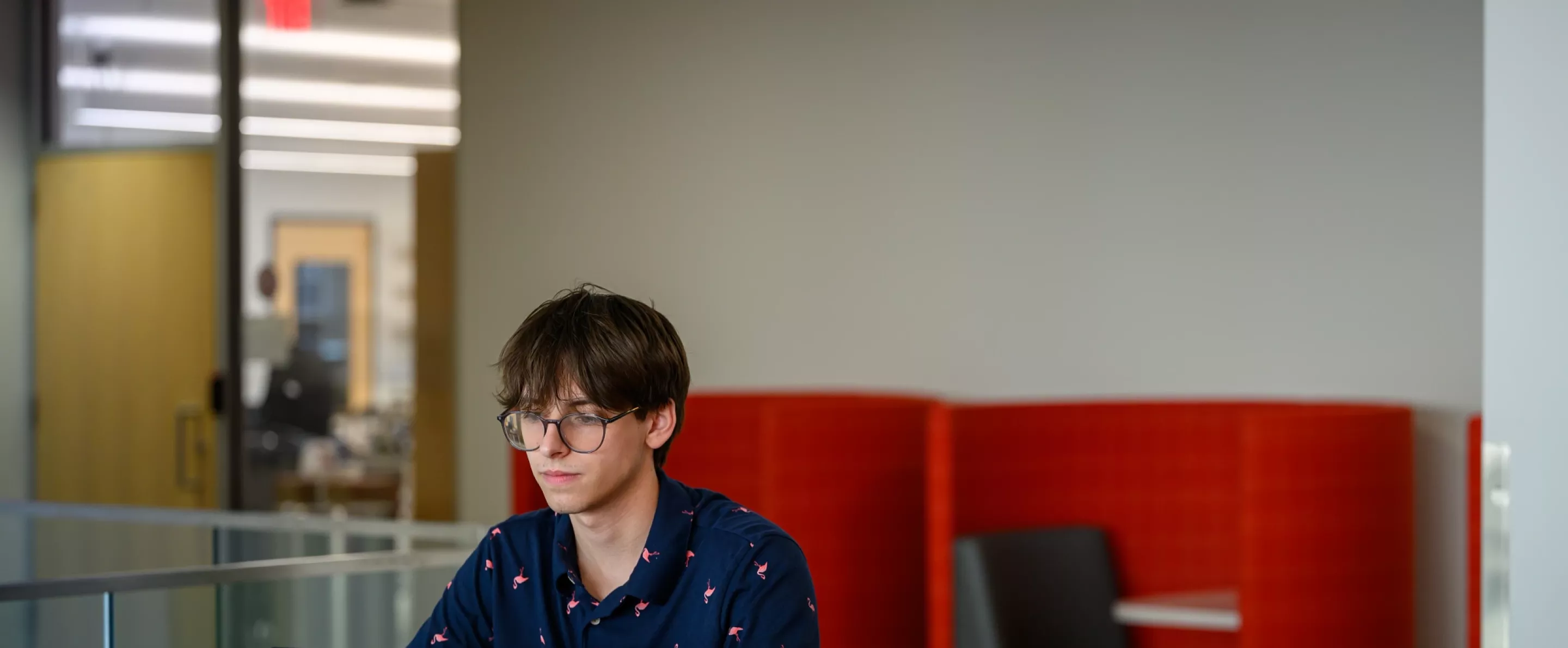 Student studying in the Belknap Academic Building