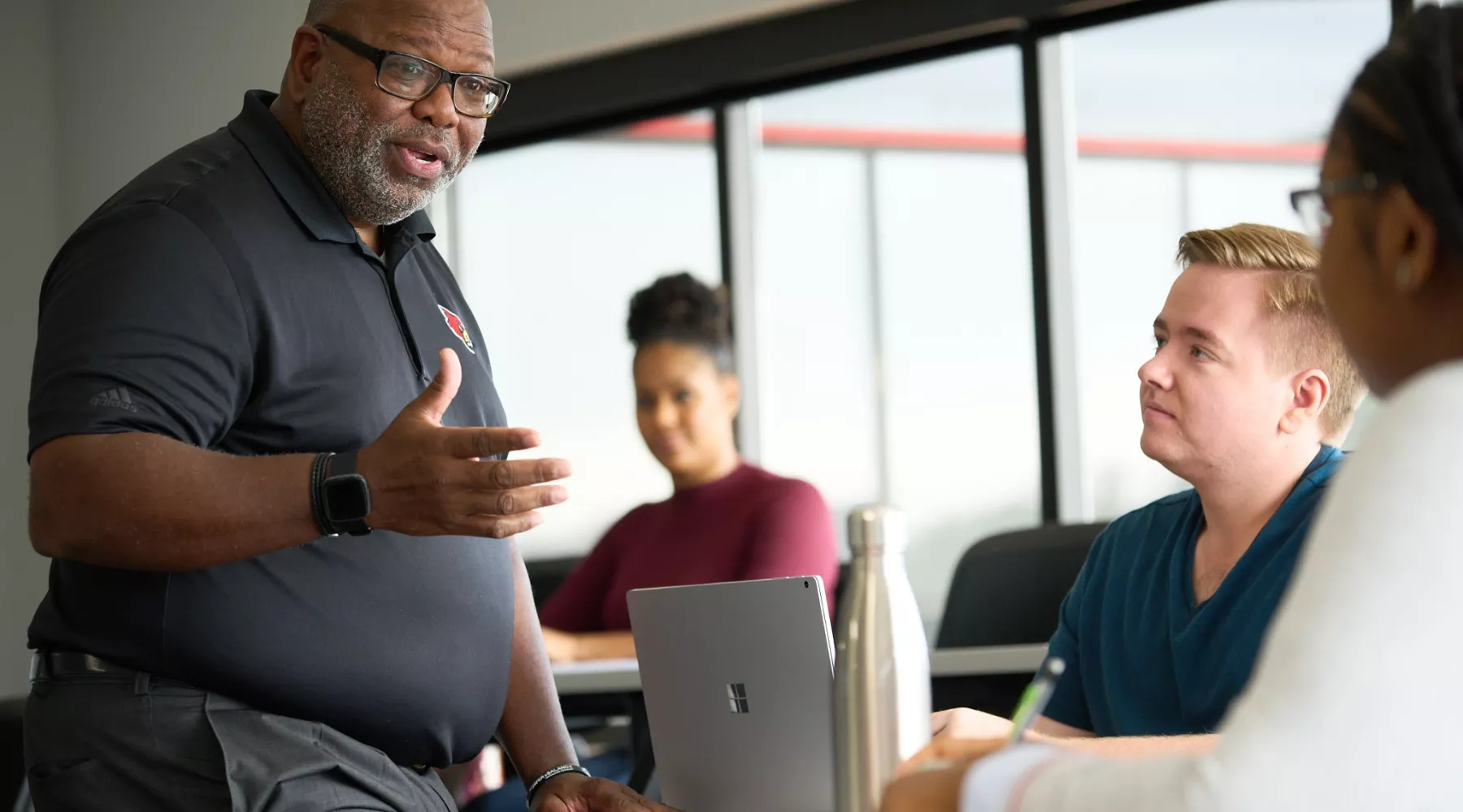 Professor Michael Wade teaching students in the College of Business.