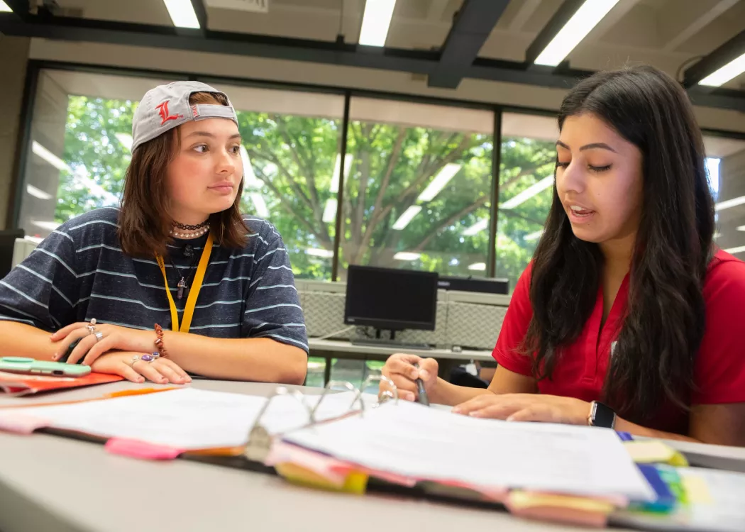 Student with an academic advisor during Orientation