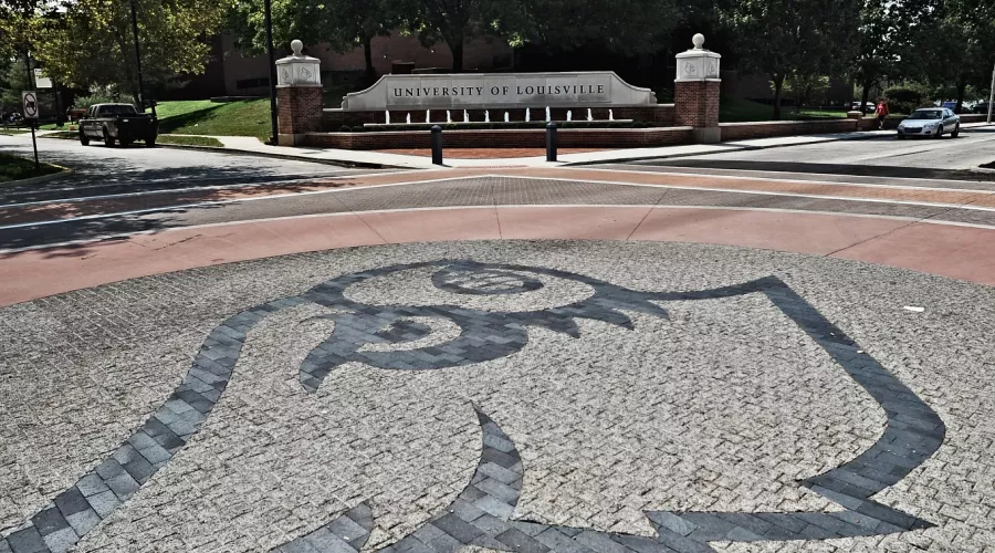 Cardinal on street in front of the North Entrance